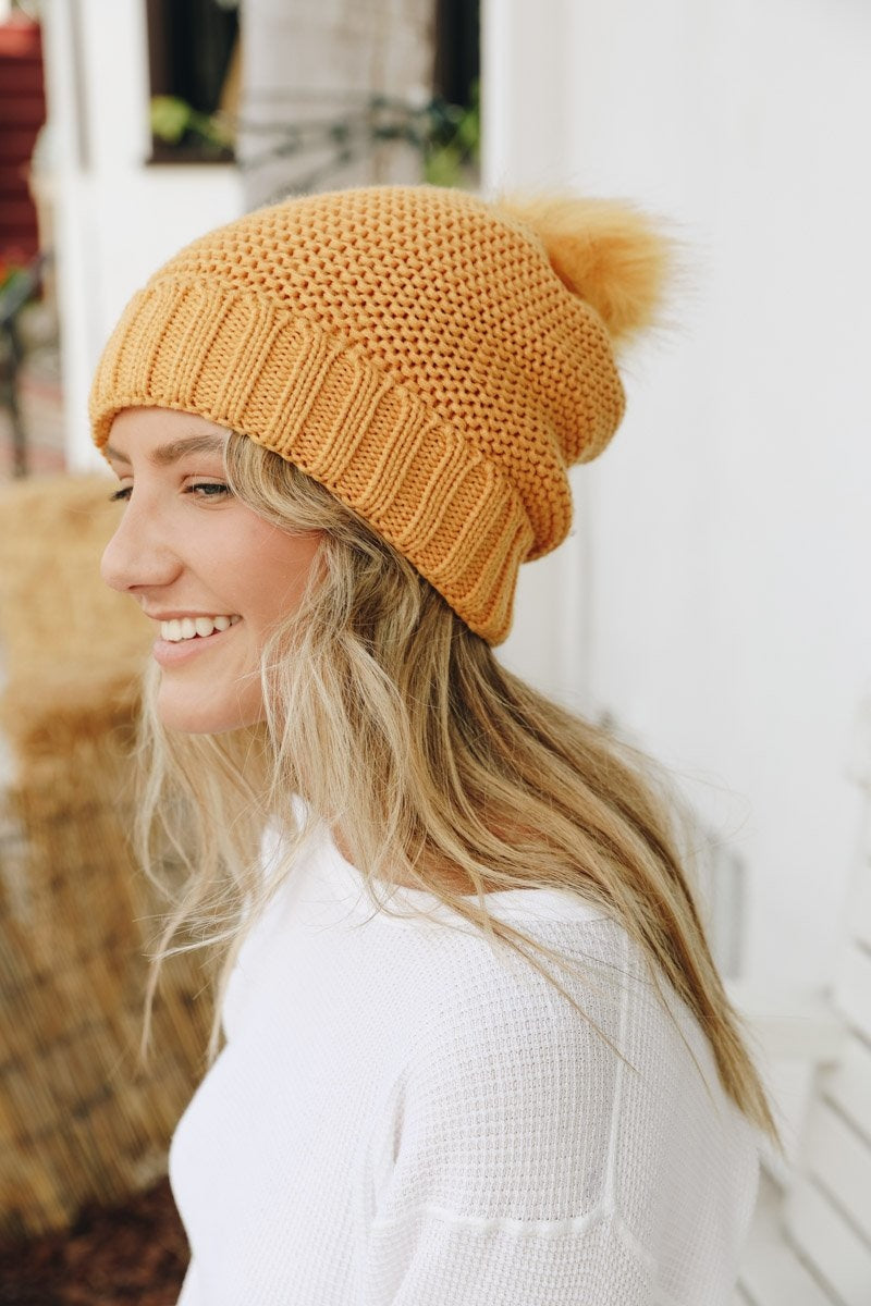 Pom Beanie with Faux Sherpa Lining